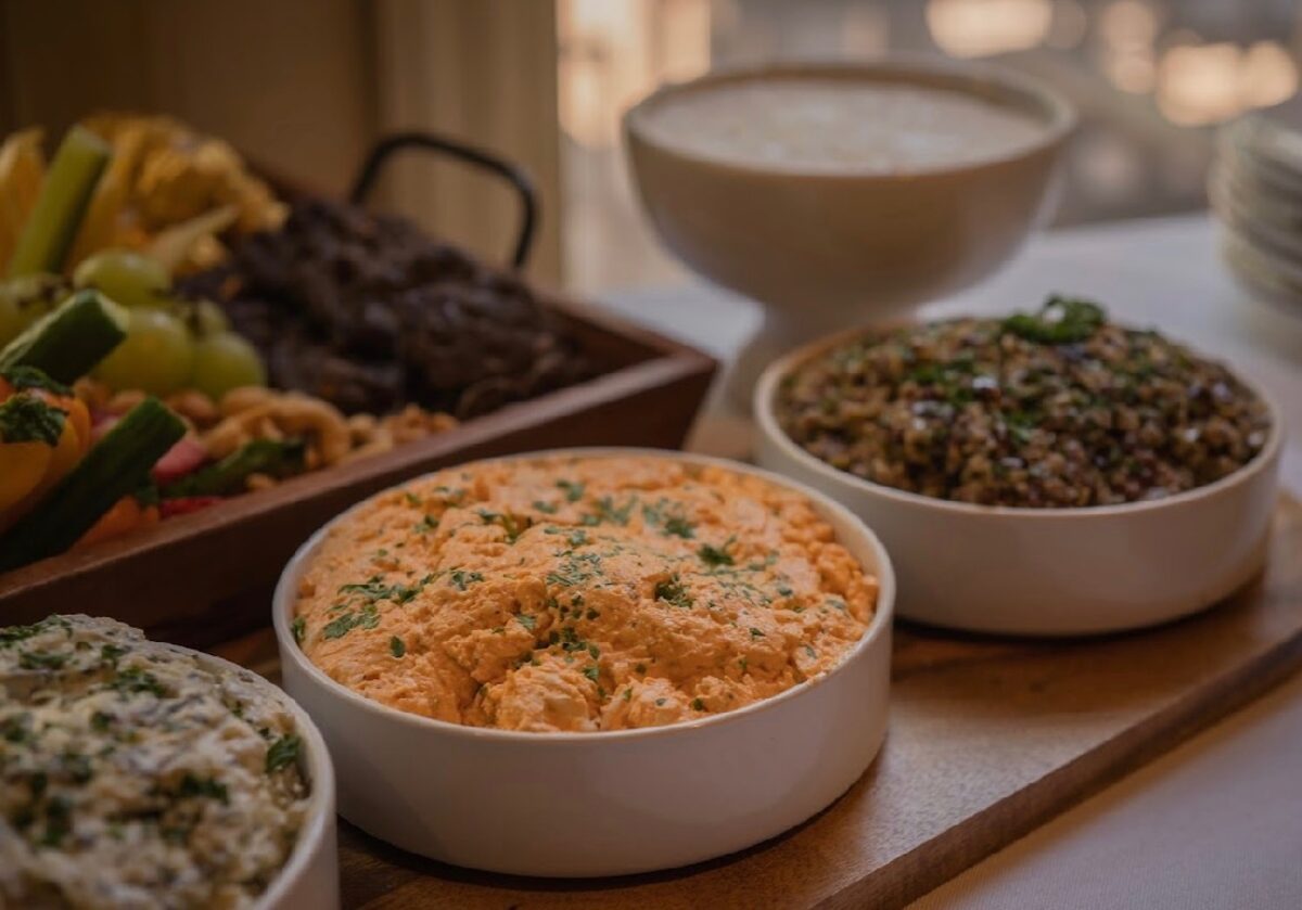 House dips garnished with fresh herbs